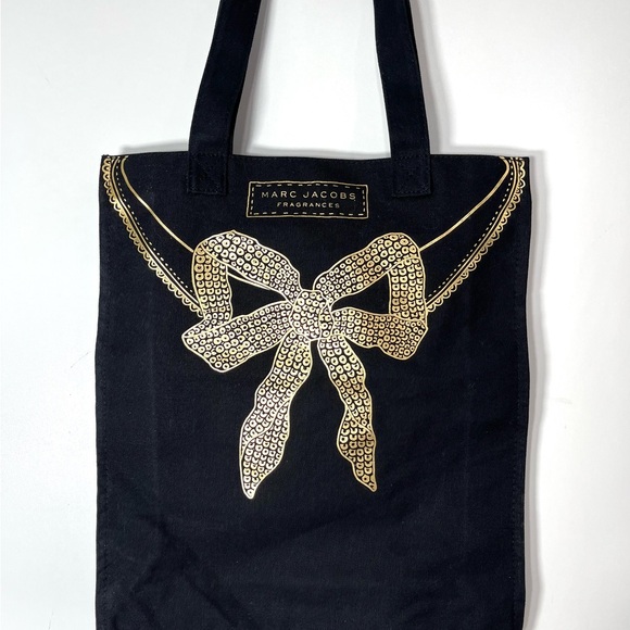 Marc Jacobs Handbags - Marc Jacobs Fragrances Black canvas cotton tote with Gold Bow Design